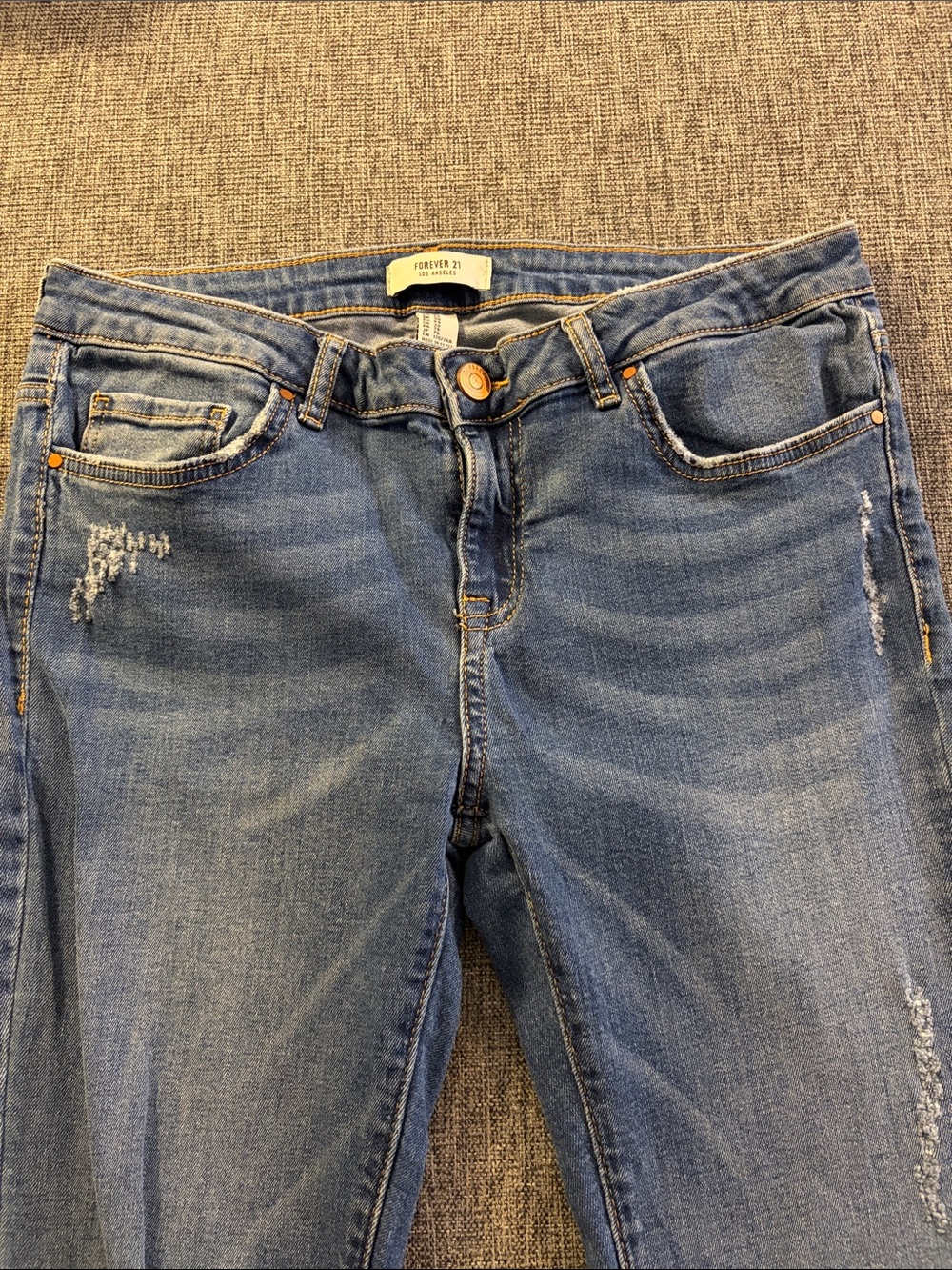 Forever 21 Women's Light Blue Skinny Jeans with Subtle Distress